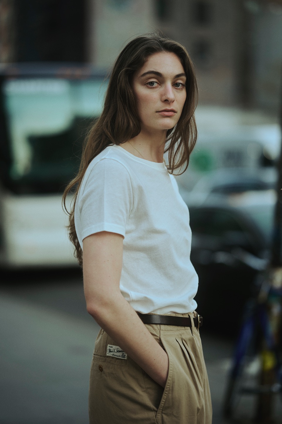 woman wearing white t-shirt and khaki pants