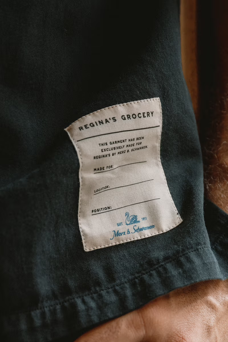 Closeup of a woven label on a black jacket